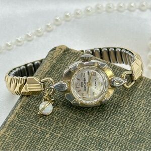 Vintage Jean Cardot Wind Up Gold Watch with Opal Saturn Charm